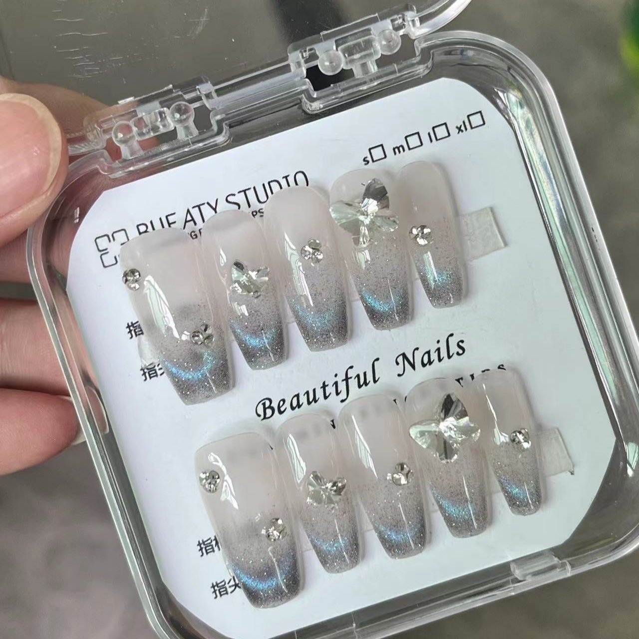 H198 SILVER BATTERFLY HANDMADE NAIL