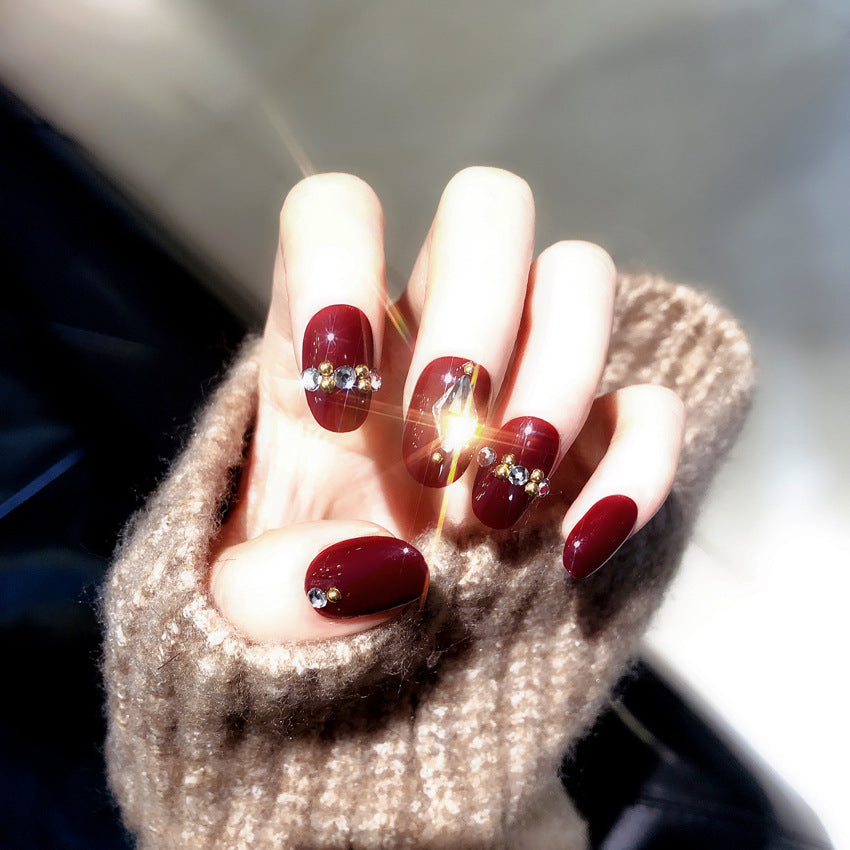 F45 Wine red studded with diamonds MEDIUM NAIL