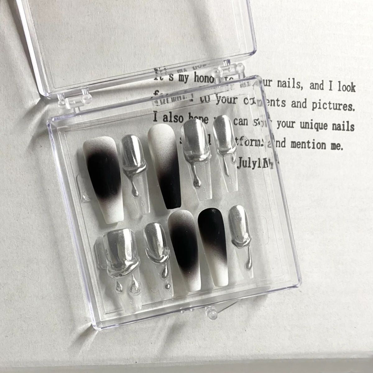 H135 Technological liquid silver black HANDMADE NAIL