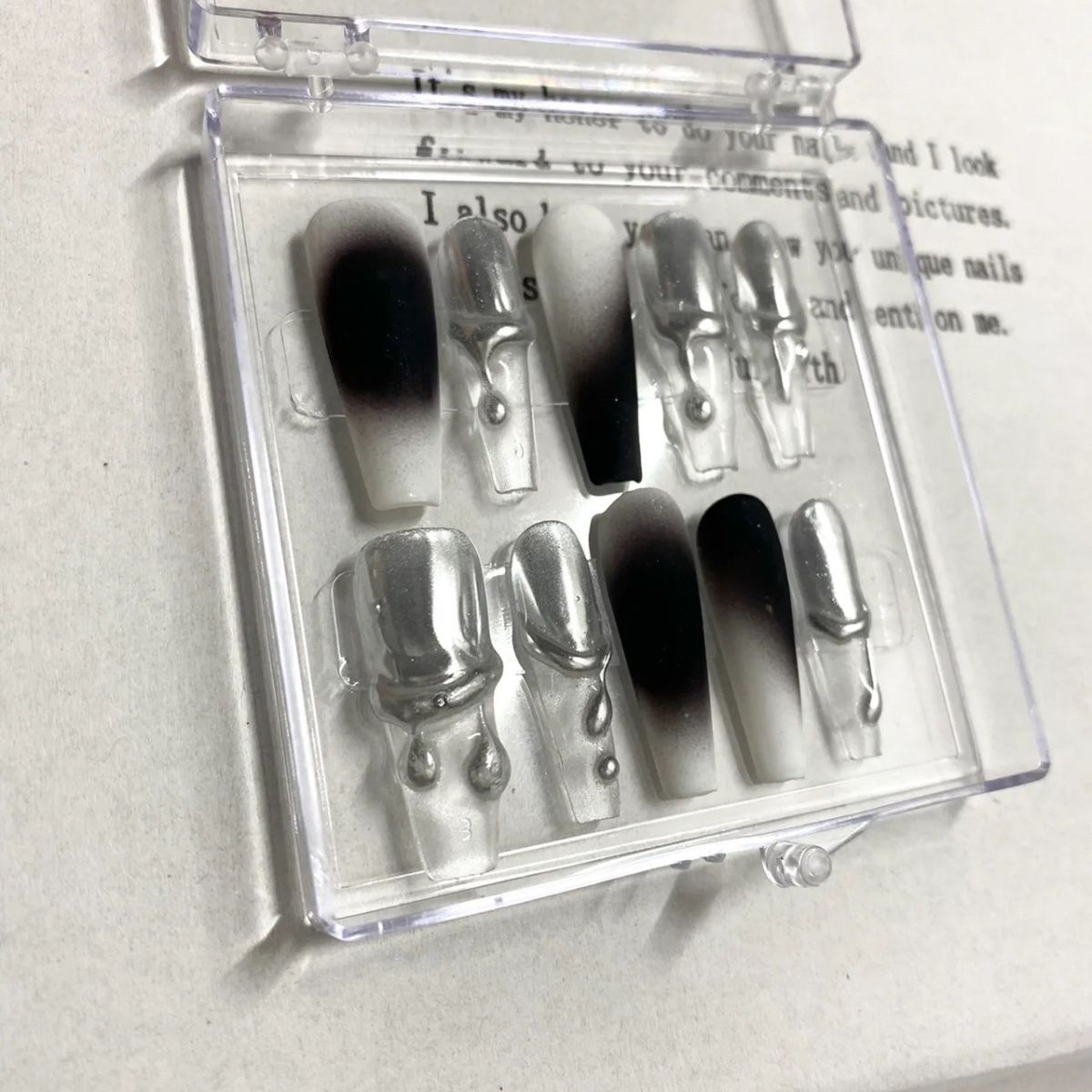 H135 Technological liquid silver black HANDMADE NAIL